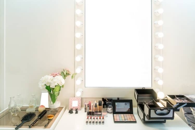 makeup mirror with lights around it